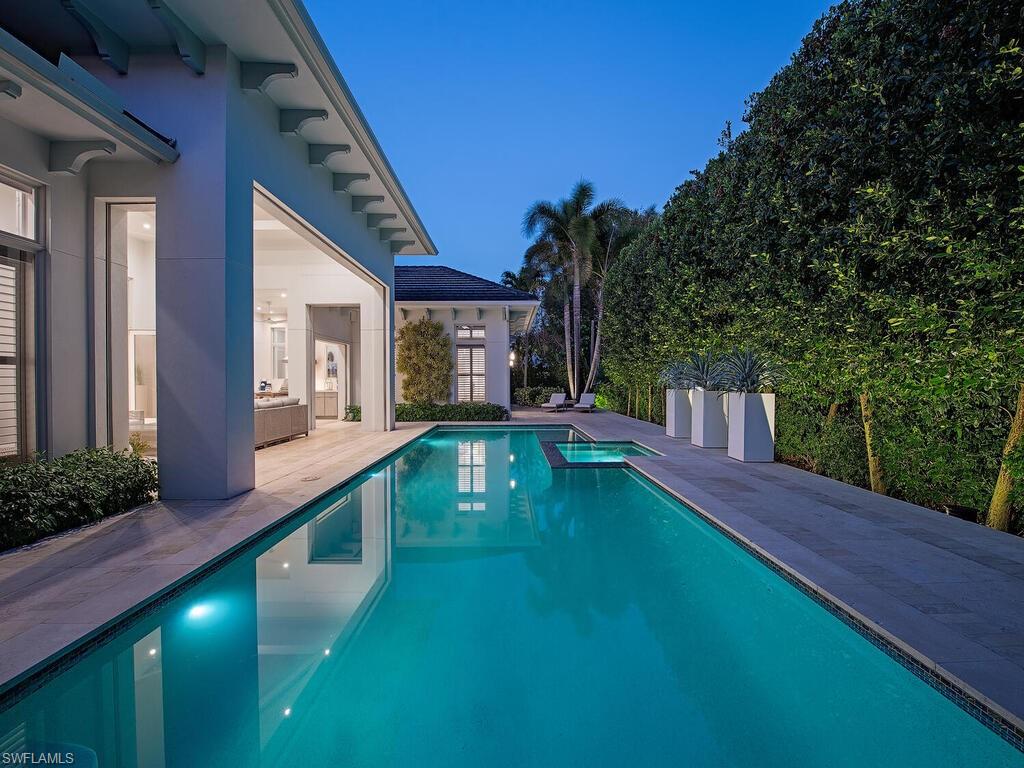 452 Putter Point Drive Naples, FL 34103 - Photo 25 of 28 Heated Pool and Spa