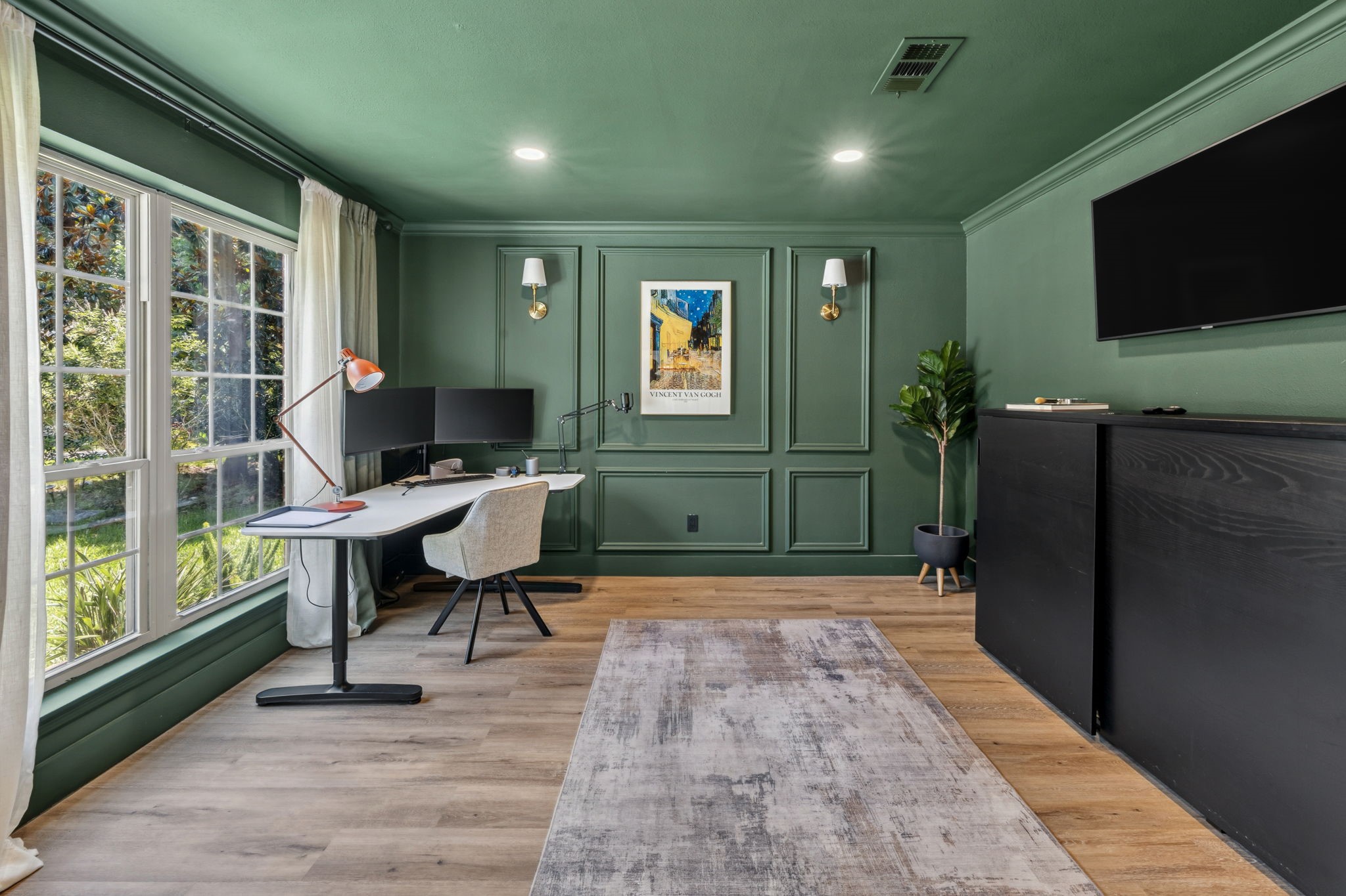 129 North Rainbow Ridge Circle Spring, TX 77381 - Photo 7 of 47 A moody green office designed to inspire focus, creativity, and calm