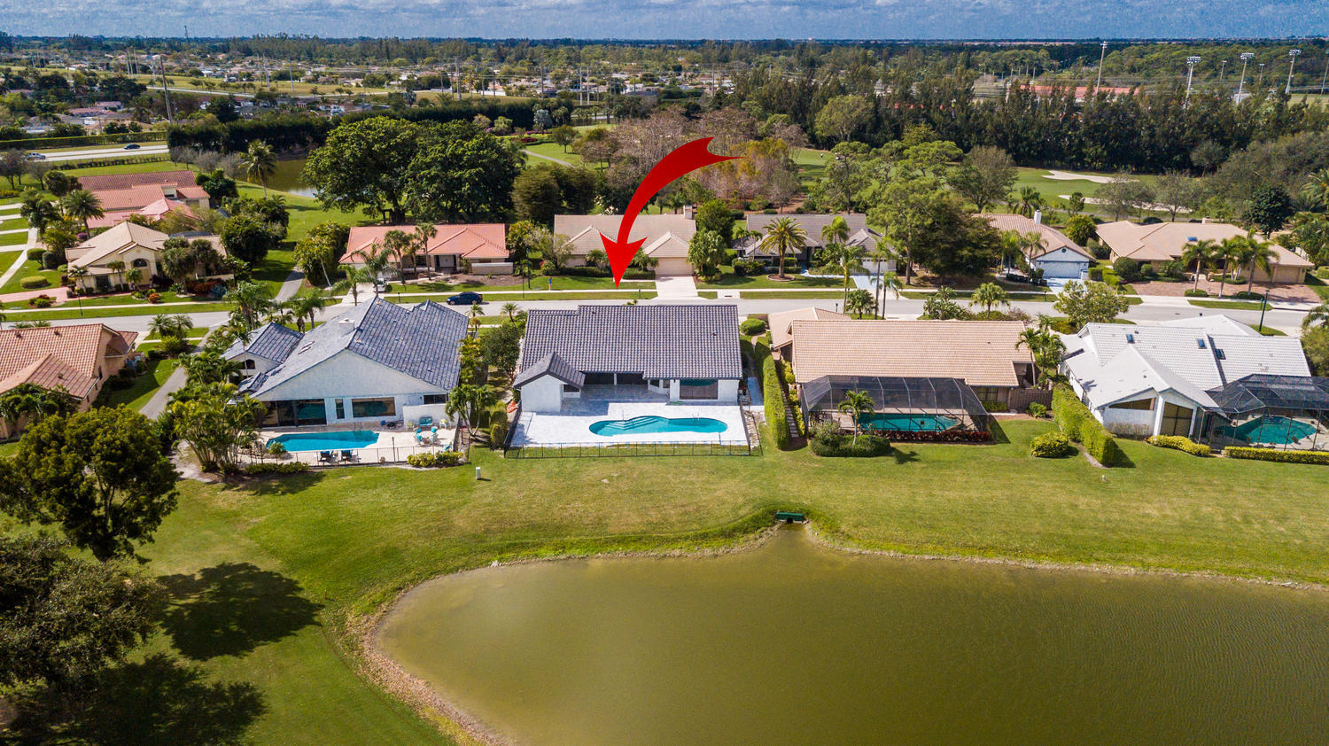 10803 Boca Woods Lane Boca Raton, FL 33428 - Photo 50 of 59 arrow 3