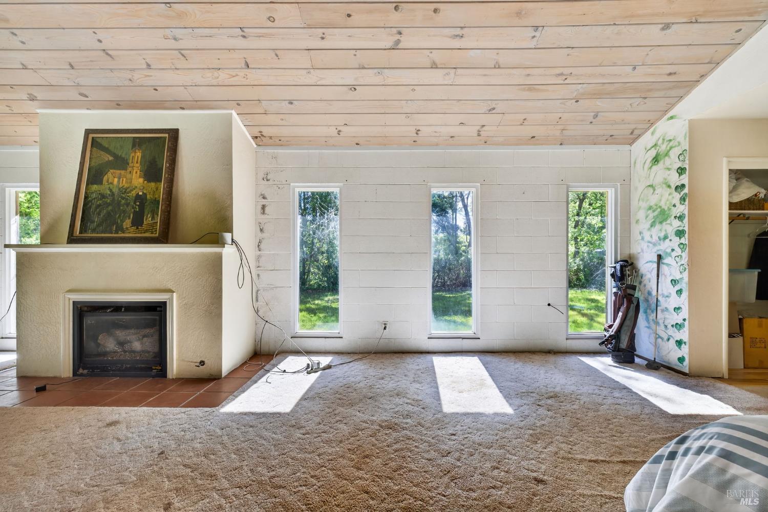3320 Redwood Road Napa, CA 94558 - Photo 29 of 57 a view of a livingroom with an empty space and a fireplace