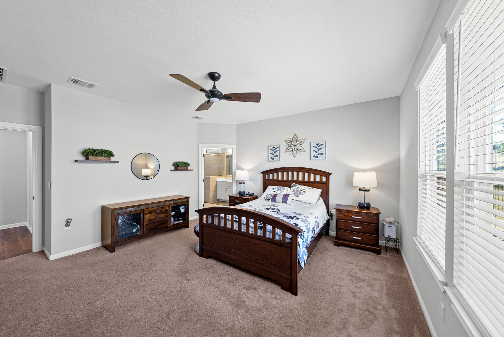 642 Martingale Street Georgetown, TX 78633 - Photo 18 of 40 Your private sanctuary awaits! The generous primary bedroom easily accommodates a full king-sized furniture set.