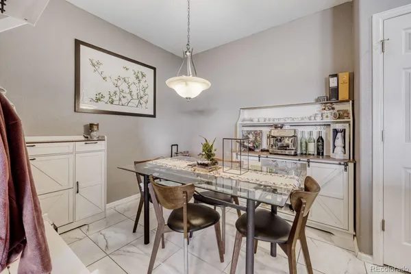 a view of a dining room with furniture
