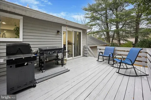 a view of swimming pool with a backyard