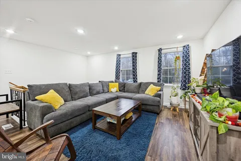 a living room with furniture and a couch