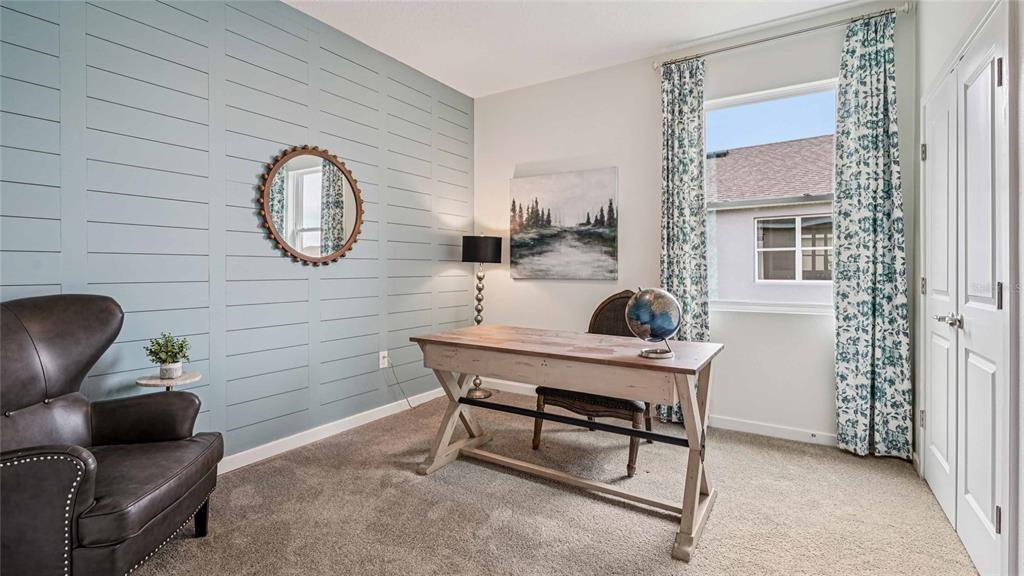 4542 Northwest 39th St Road Ocala, FL 34482 - Photo 14 of 28 a workspace with furniture and window