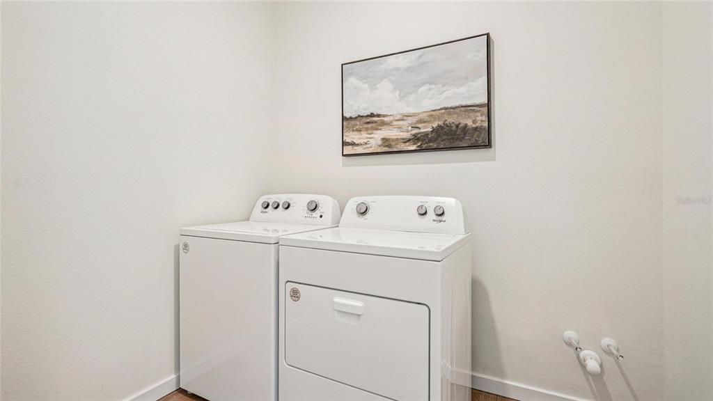 4542 Northwest 39th St Road Ocala, FL 34482 - Photo 18 of 28 a utility room with dryer and washer