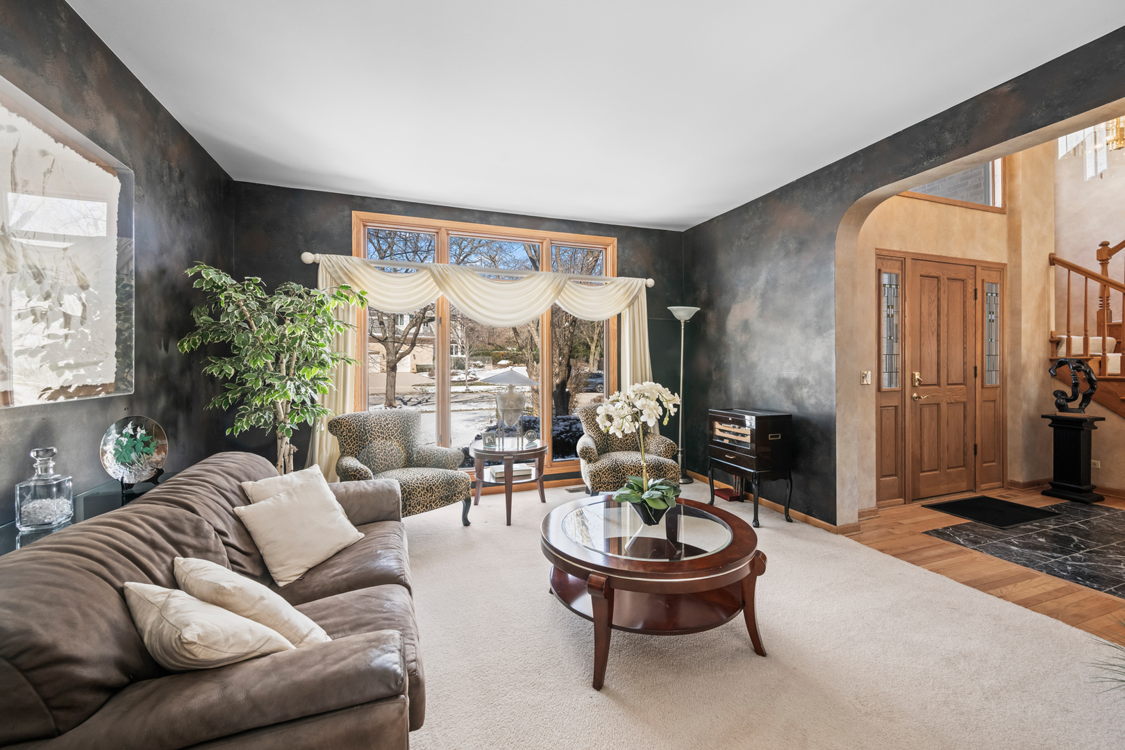 1380 Prestwick Lane Itasca, IL 60143 - Photo 13 of 45 a living room with furniture and a large window