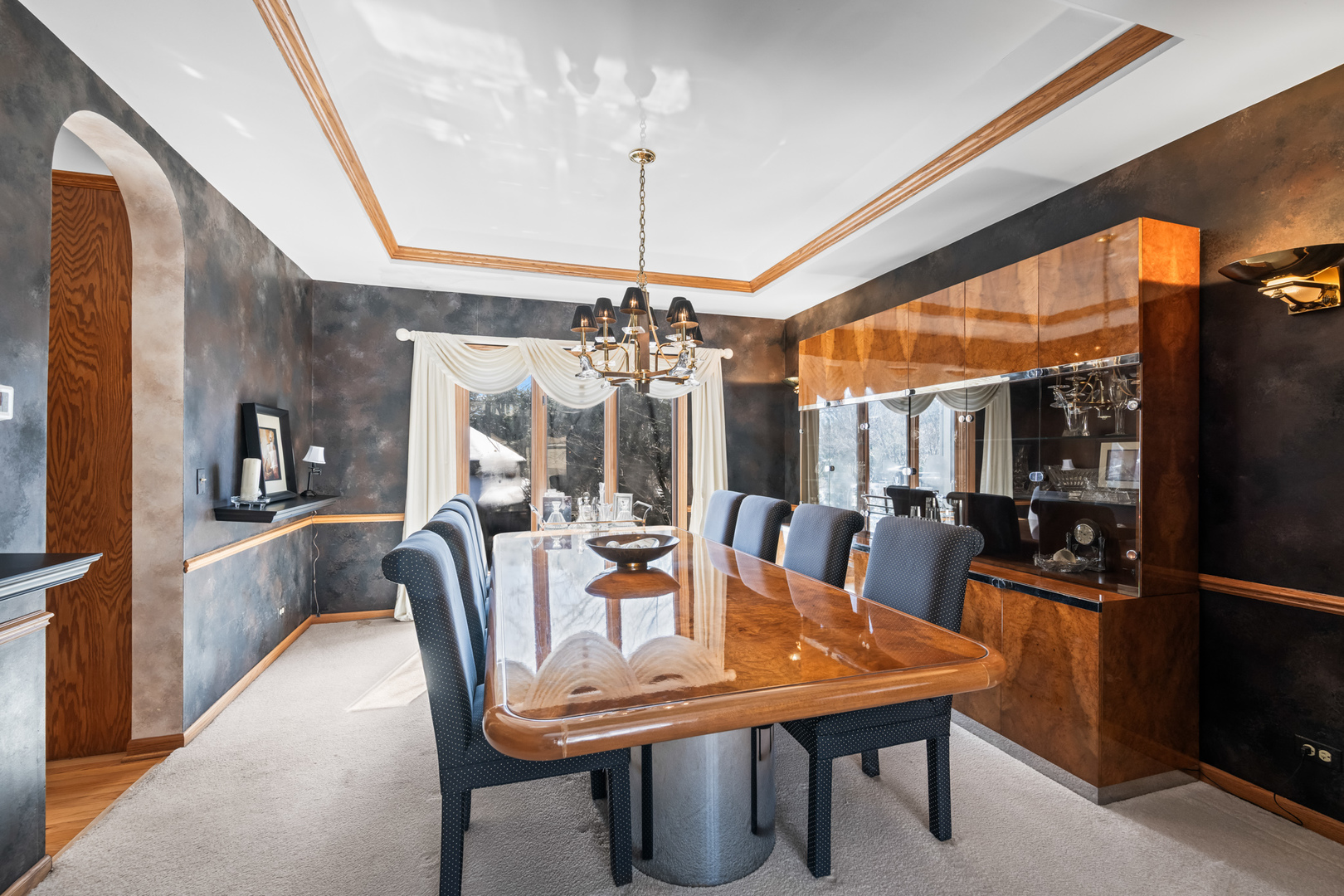 1380 Prestwick Lane Itasca, IL 60143 - Photo 15 of 45 a dining room with furniture a chandelier and wooden floor