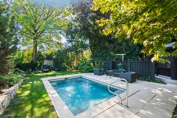 a view of a backyard with a patio