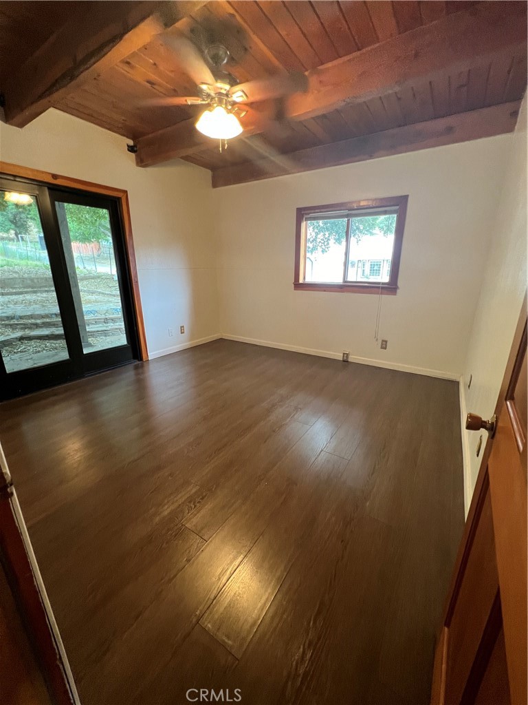 29716 Jackson Street Castaic, CA 91384 - Photo 19 of 38 wooden floor in an empty room with a window