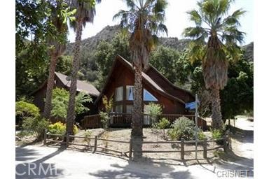 29716 Jackson Street Castaic, CA 91384 - Photo 2 of 38 a view of a house with a yard and sitting area