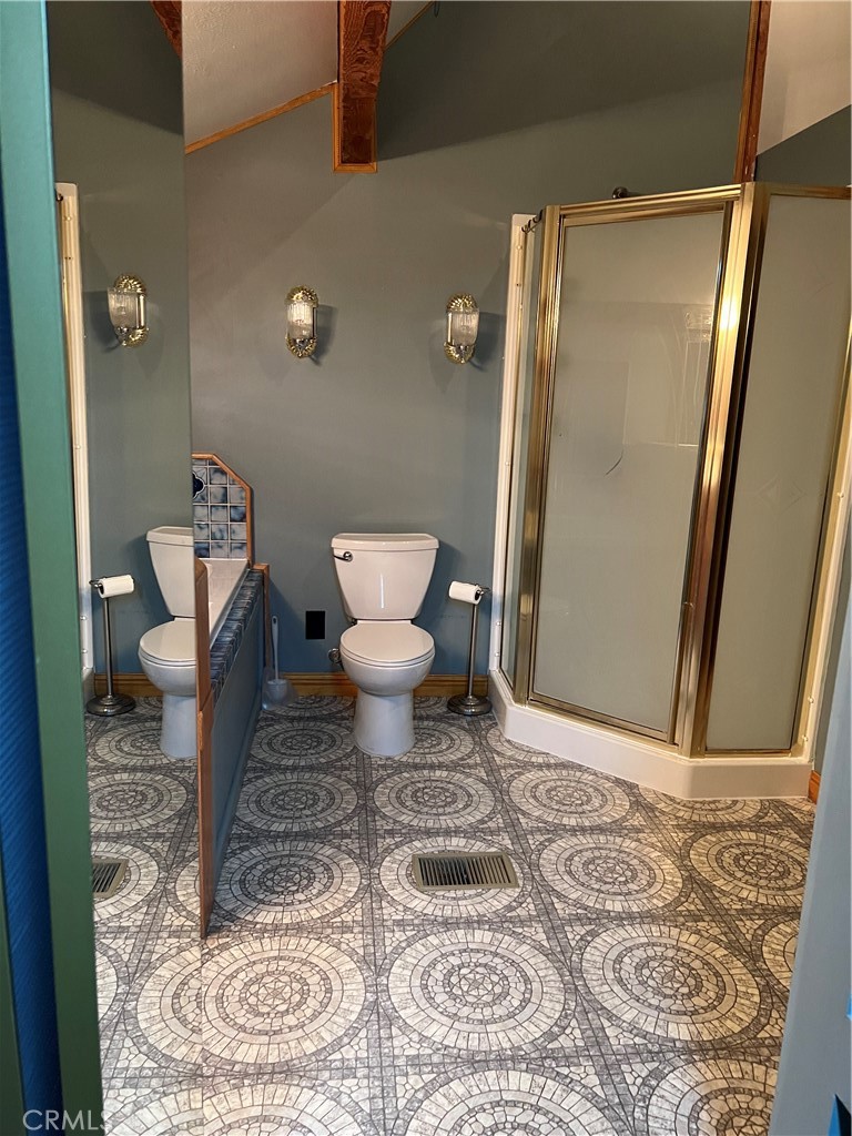 29716 Jackson Street Castaic, CA 91384 - Photo 34 of 38 a bathroom with a toilet and a shower