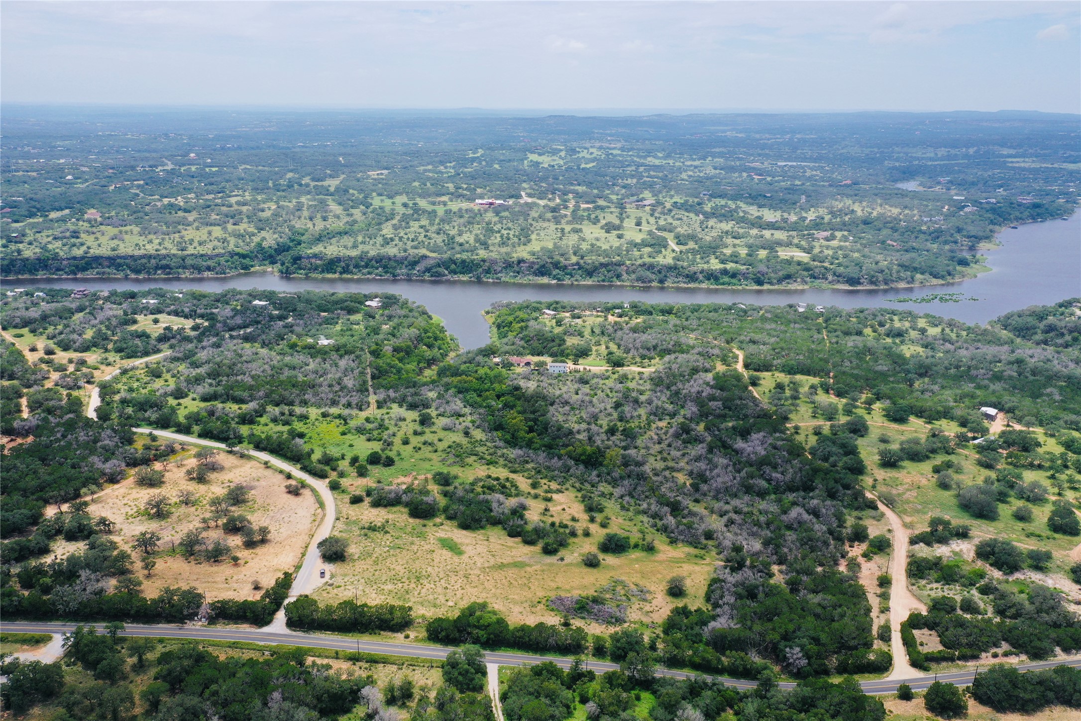 23601 Old Ferry Road, Unit 1 Spicewood, TX 78669 - Photo 2 of 33 an aerial view of multiple house