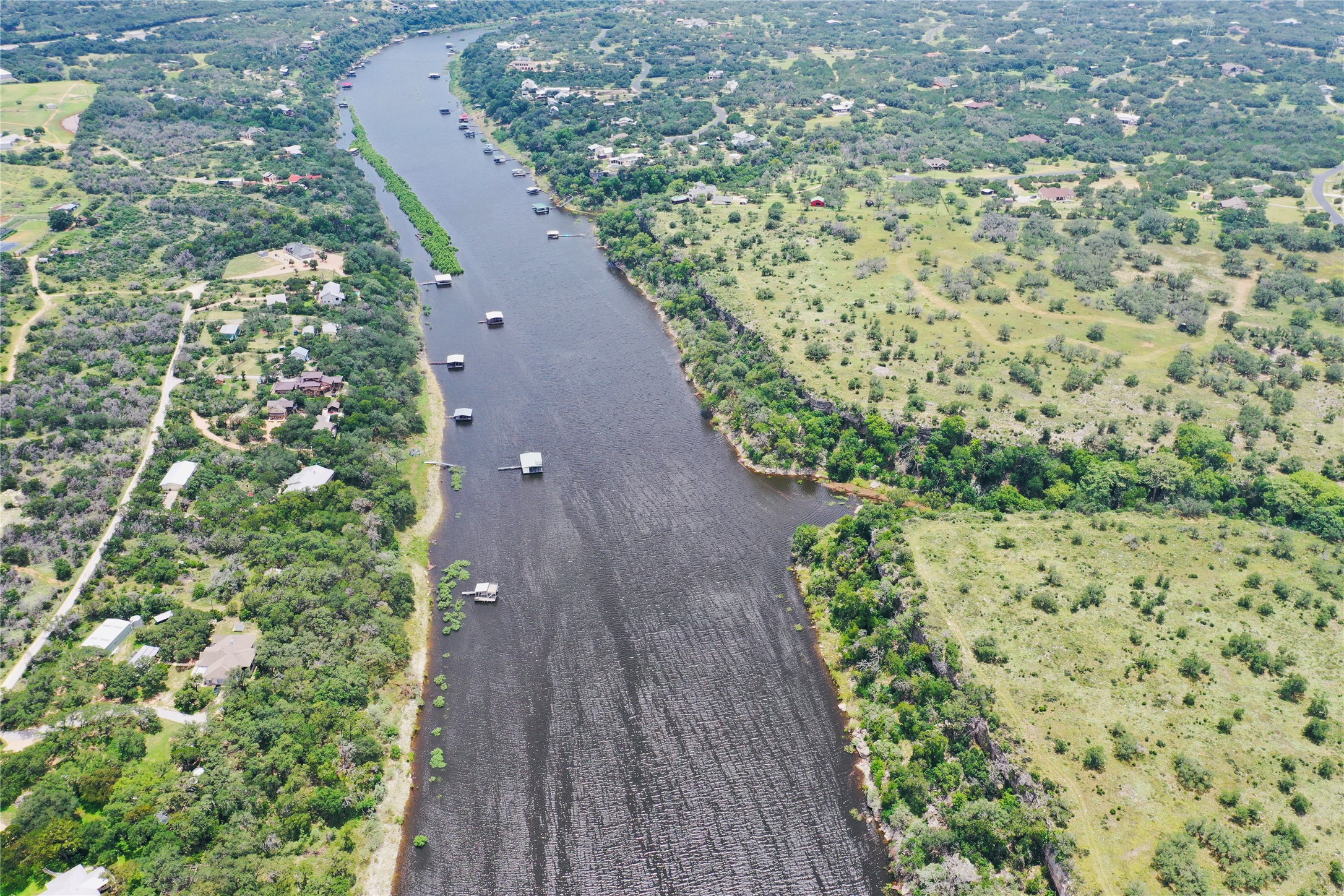 23601 Old Ferry Road, Unit 1 Spicewood, TX 78669 - Photo 3 of 33 a view of a garden with plants