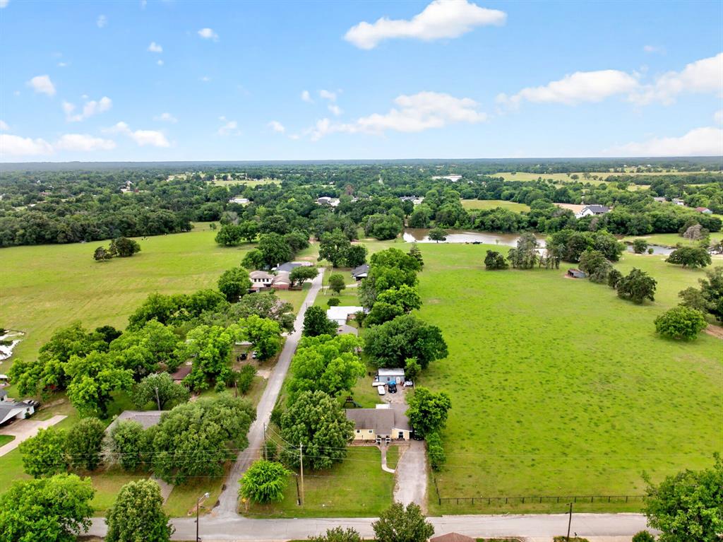 610 Crooked Creek Road Edgewood, TX 75117 - Photo 30 of 33 an aerial view of ocean residential house with outdoor space and trees all around