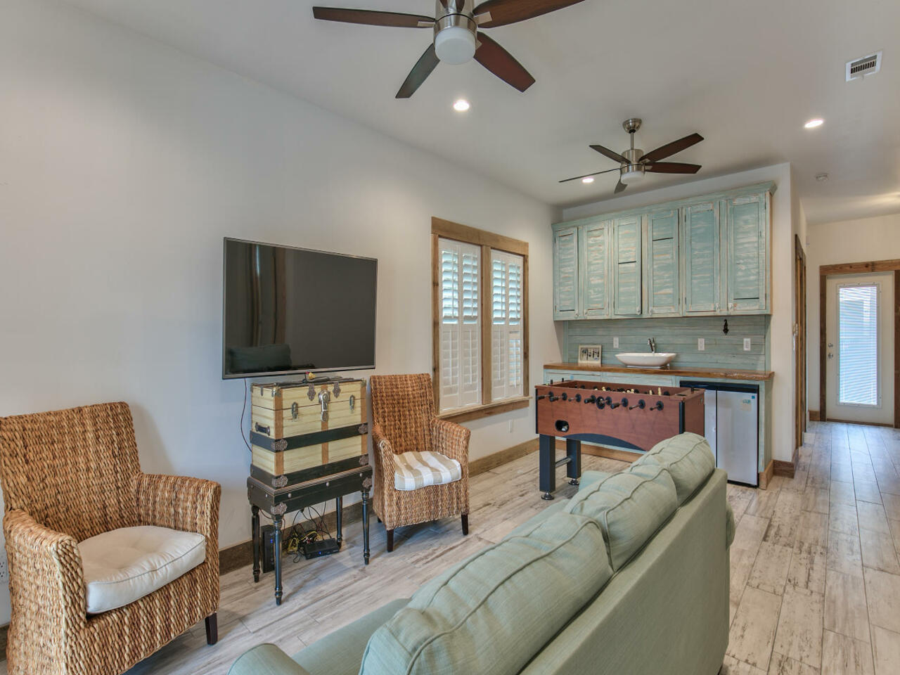 42 West Seacrest Beach Blvd Inlet Beach Inlet Beach, FL 32461 - Photo 12 of 52 a living room with furniture and a flat screen tv