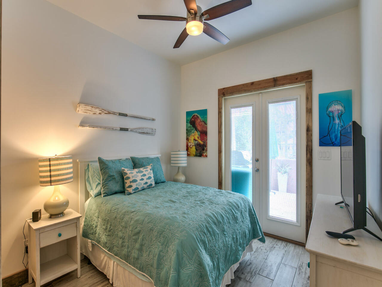 42 West Seacrest Beach Blvd Inlet Beach Inlet Beach, FL 32461 - Photo 13 of 52 a bedroom with a bed and wooden floor