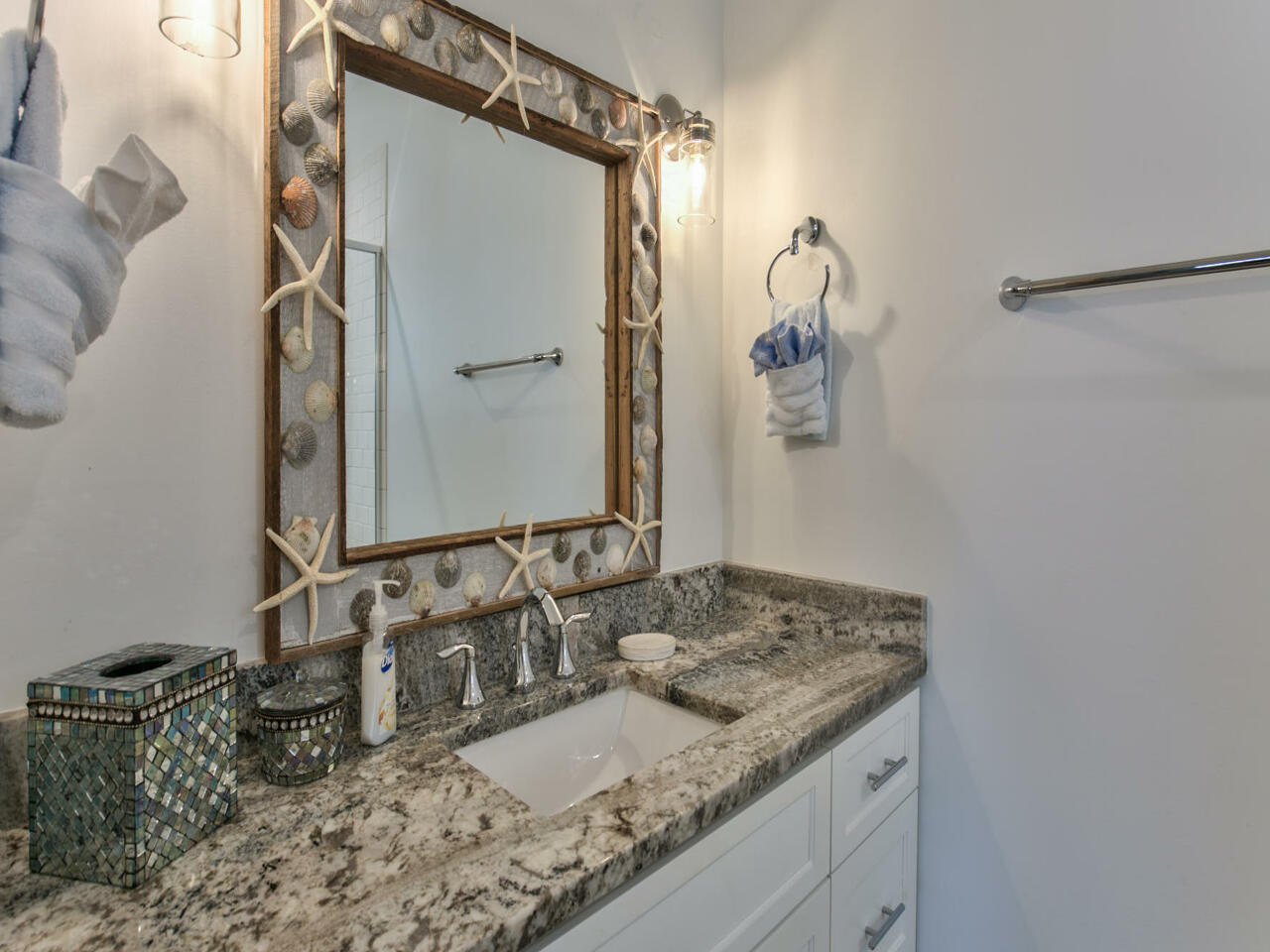 42 West Seacrest Beach Blvd Inlet Beach Inlet Beach, FL 32461 - Photo 14 of 52 a bathroom with a granite countertop sink and a mirror