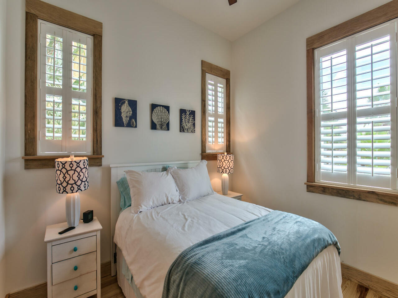 42 West Seacrest Beach Blvd Inlet Beach Inlet Beach, FL 32461 - Photo 19 of 52 a bedroom with a bed and a window