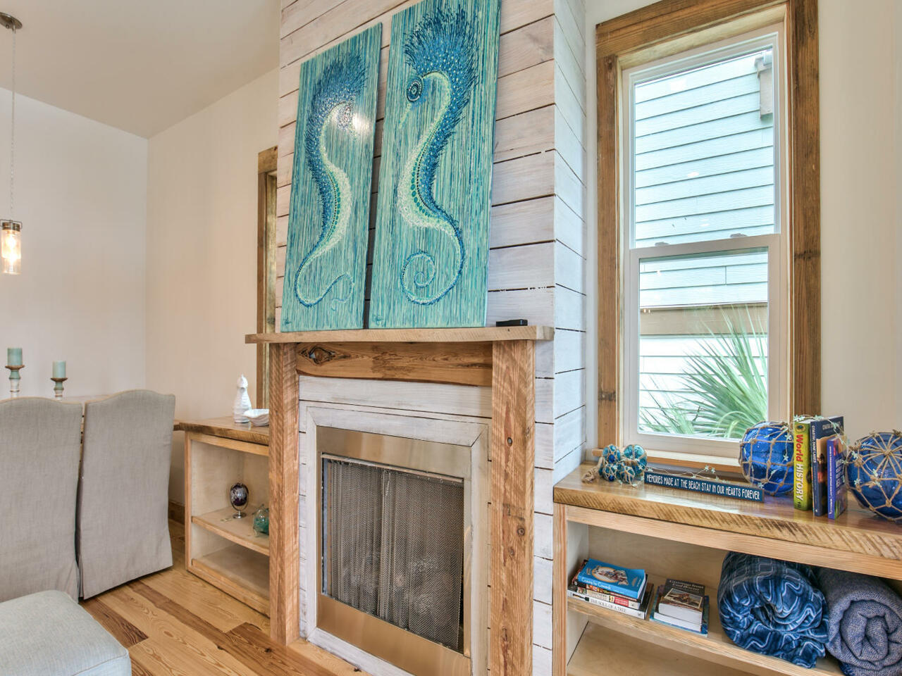 42 West Seacrest Beach Blvd Inlet Beach Inlet Beach, FL 32461 - Photo 24 of 52 a living room with a fireplace and a window