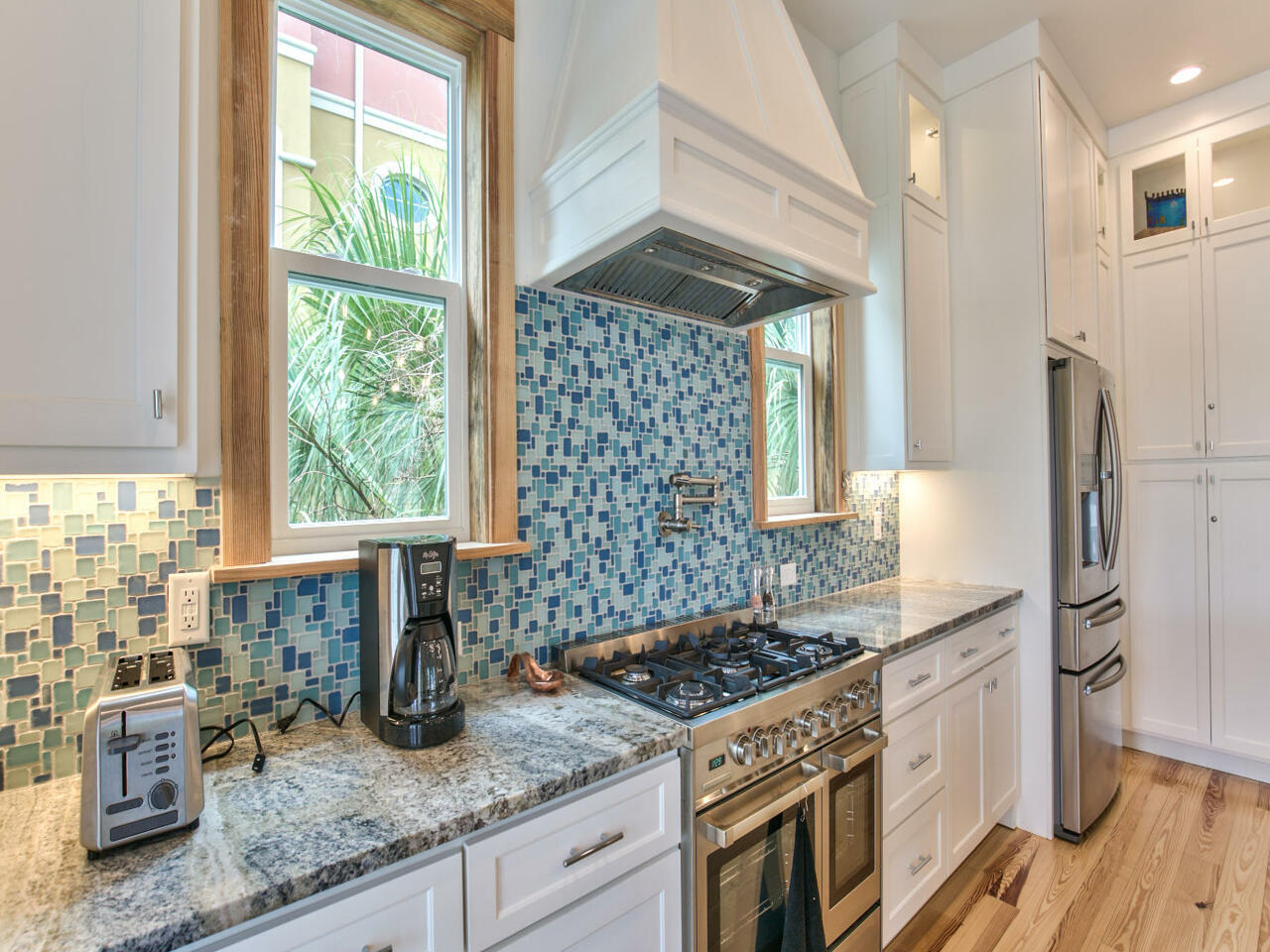 42 West Seacrest Beach Blvd Inlet Beach Inlet Beach, FL 32461 - Photo 28 of 52 a kitchen with a stove a sink and a refrigerator