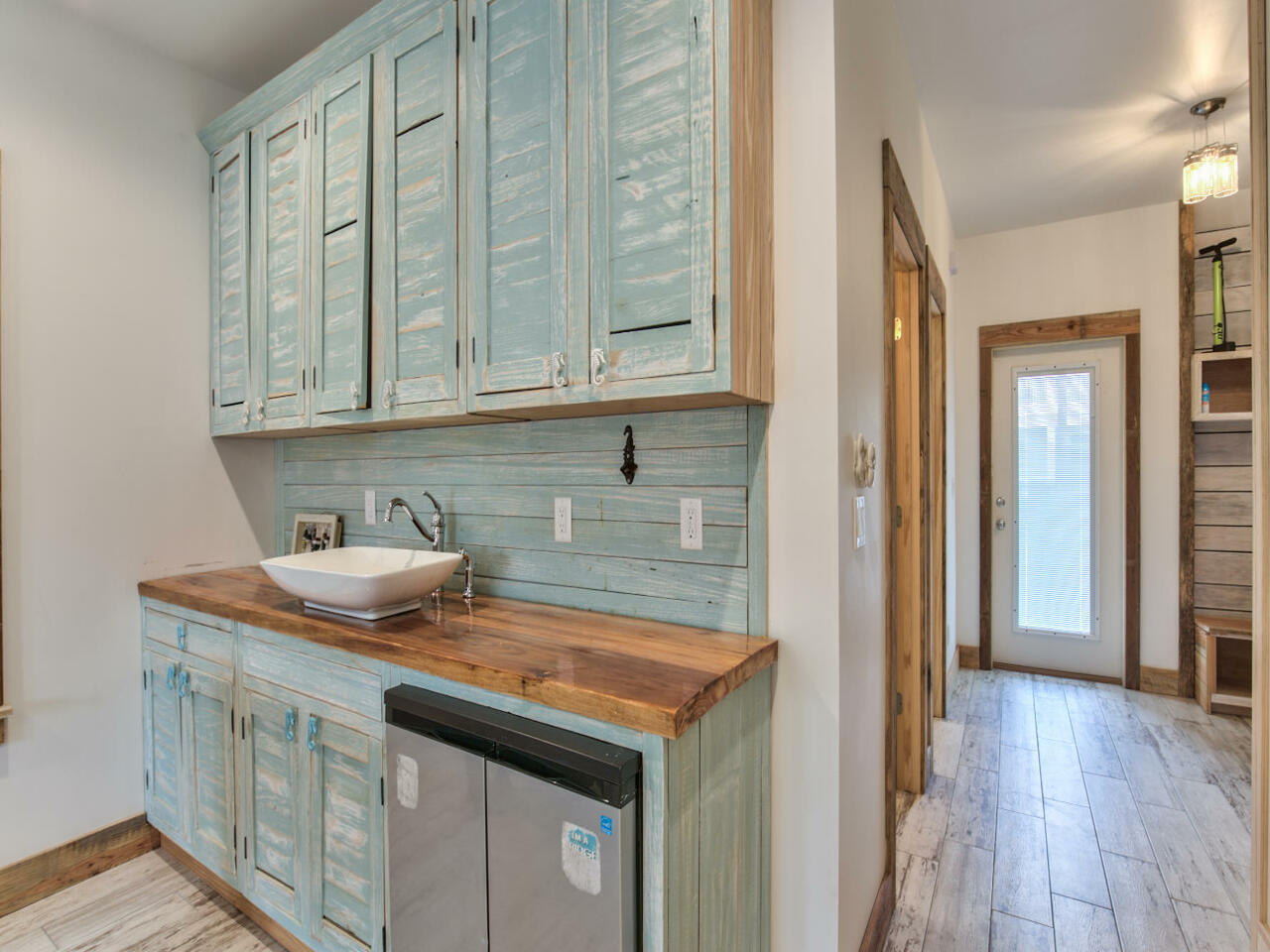 42 West Seacrest Beach Blvd Inlet Beach Inlet Beach, FL 32461 - Photo 10 of 52 a kitchen with stainless steel appliances granite countertop a sink stove and cabinets