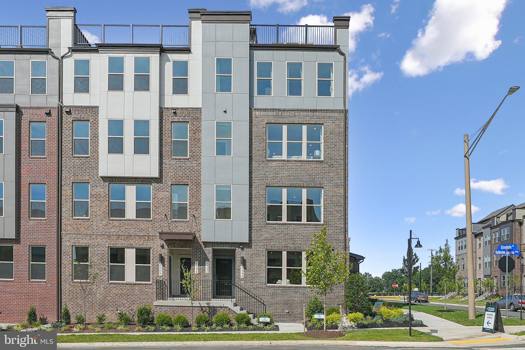 a front view of a building with street view