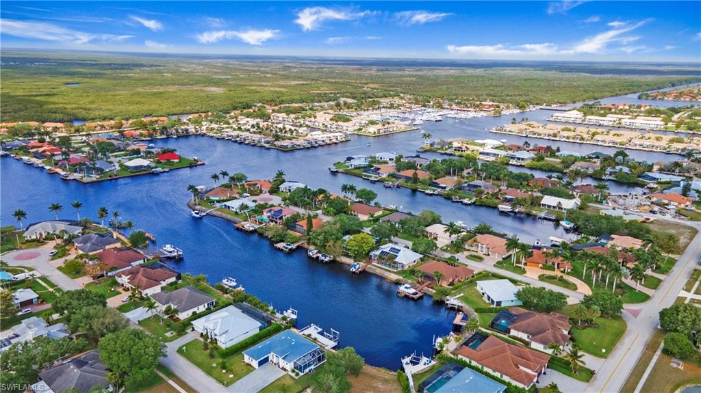 162 Windward Cay Naples, FL 34114 - Photo 21 of 35 a view of a city with an ocean view