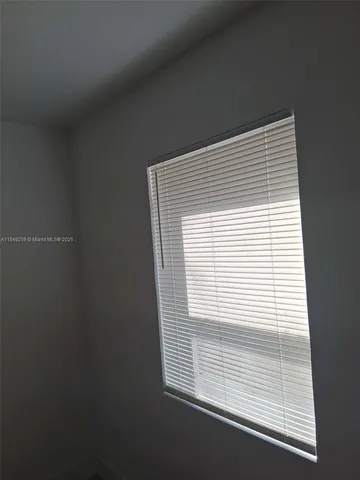 a view of a small space with a window