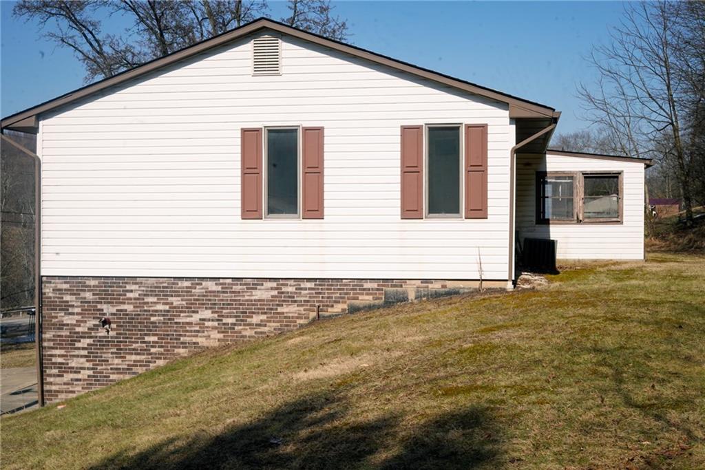 238 Victoria Way Leechburg, PA 15656 - Photo 18 of 22 a front view of a house with parking
