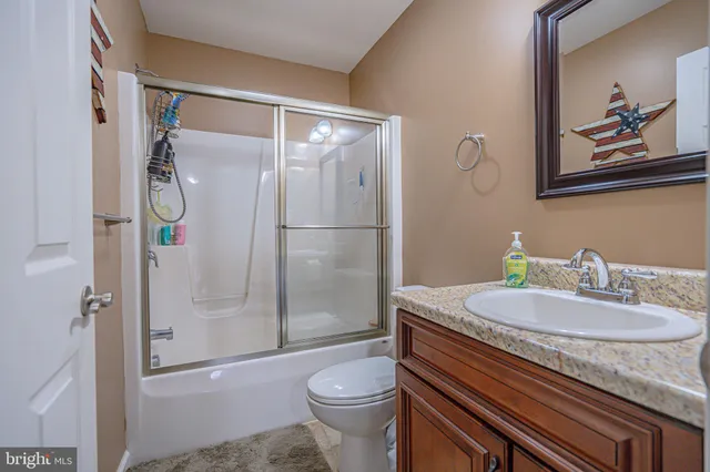 a bedroom with a bed and furniture