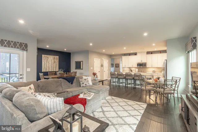 a bedroom with a bed closet and a window