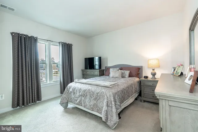 a bathroom with a sink a vanity and a mirror