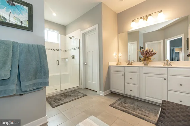 a view of a livingroom with furniture and a large window
