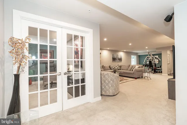 a kitchen with granite countertop a sink and a large window
