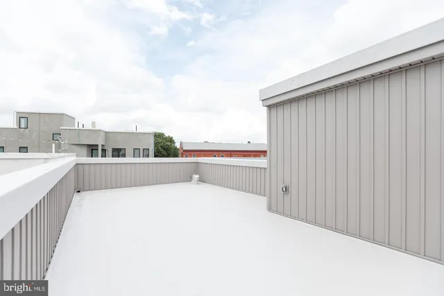 a view of balcony with stainless steel appliances