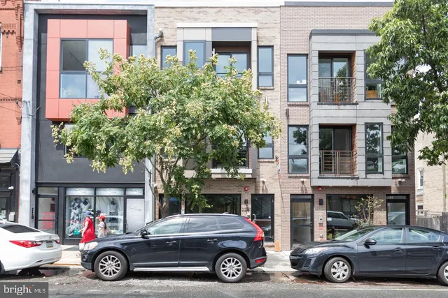 a car parked in front of a building