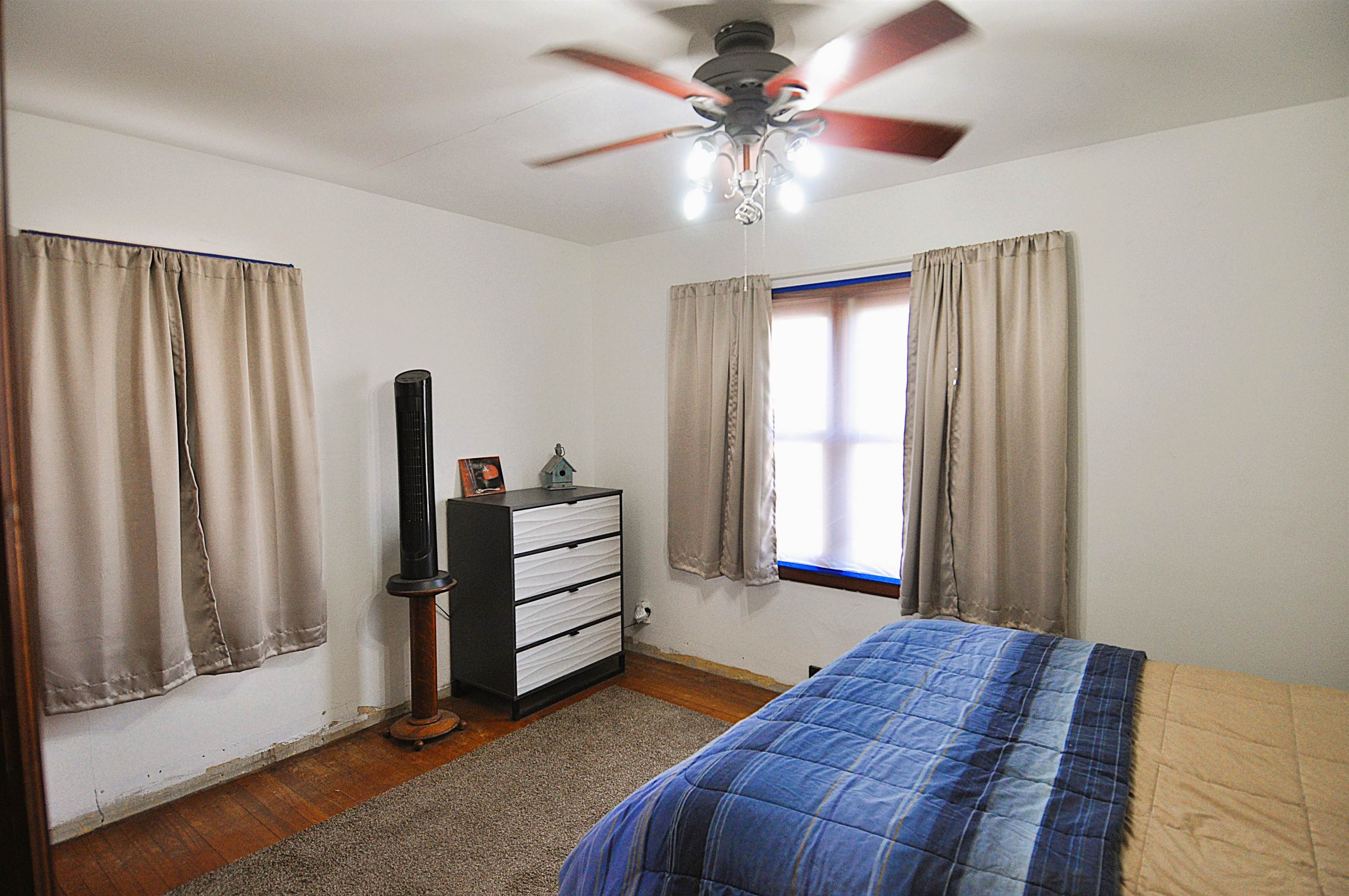 525 Church Street German Valley, IL 61039 - Photo 12 of 25 a bedroom with furniture and a window