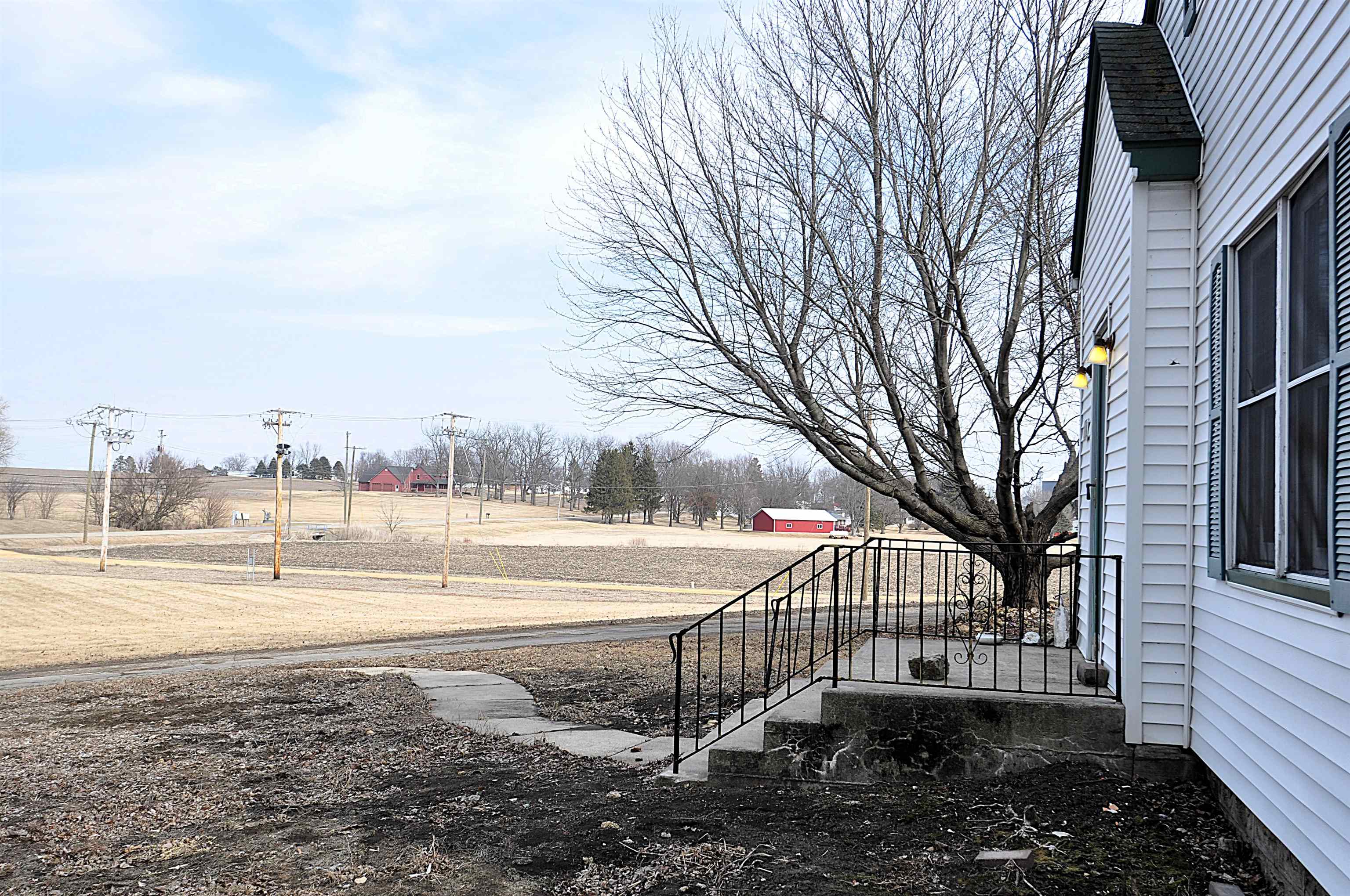 525 Church Street German Valley, IL 61039 - Photo 25 of 25 a view of a yard with large trees and a small yard