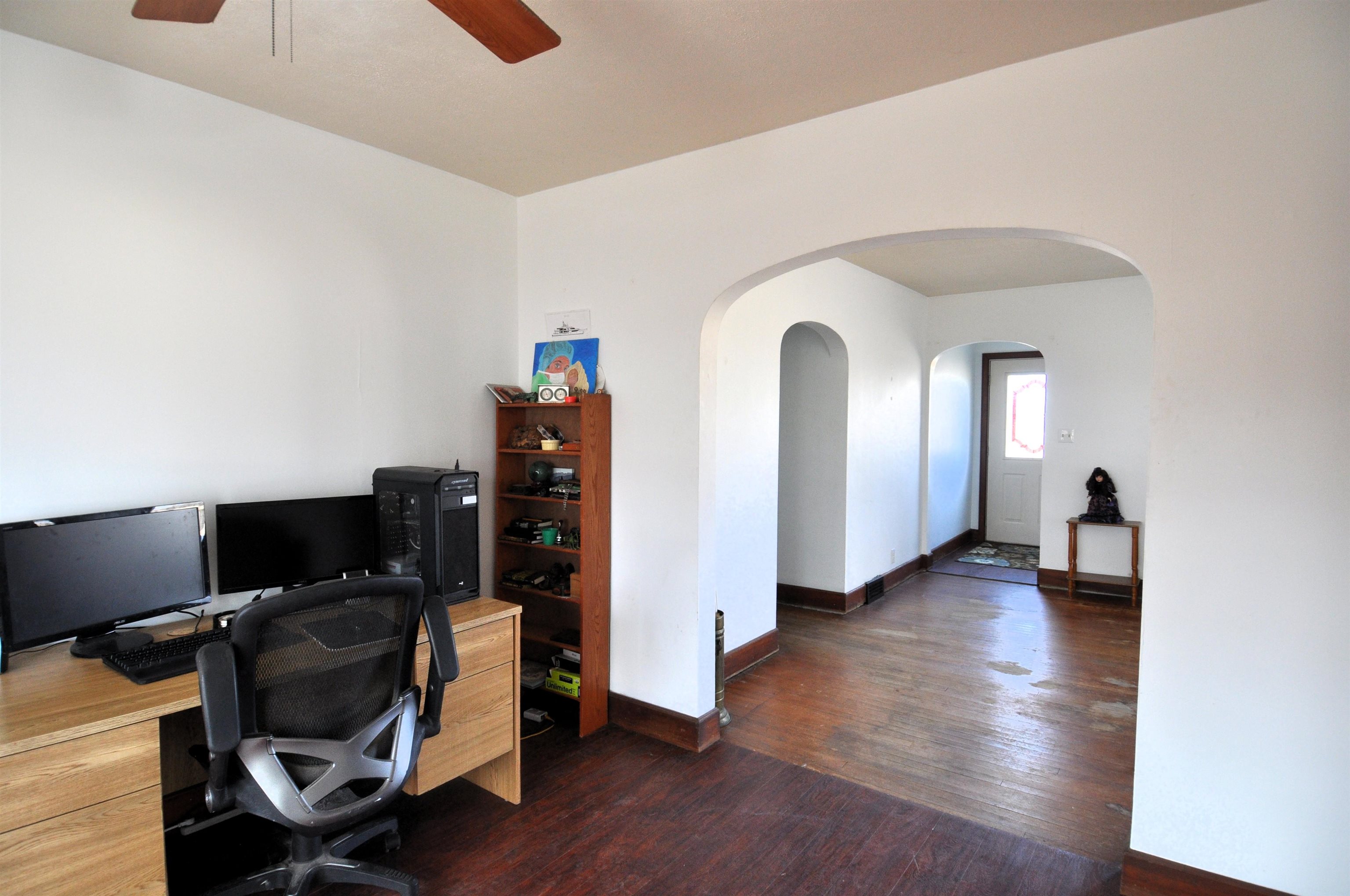 525 Church Street German Valley, IL 61039 - Photo 8 of 25 a view of a workspace with furniture and wooden floor