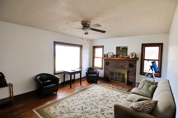 a bedroom with furniture and a window