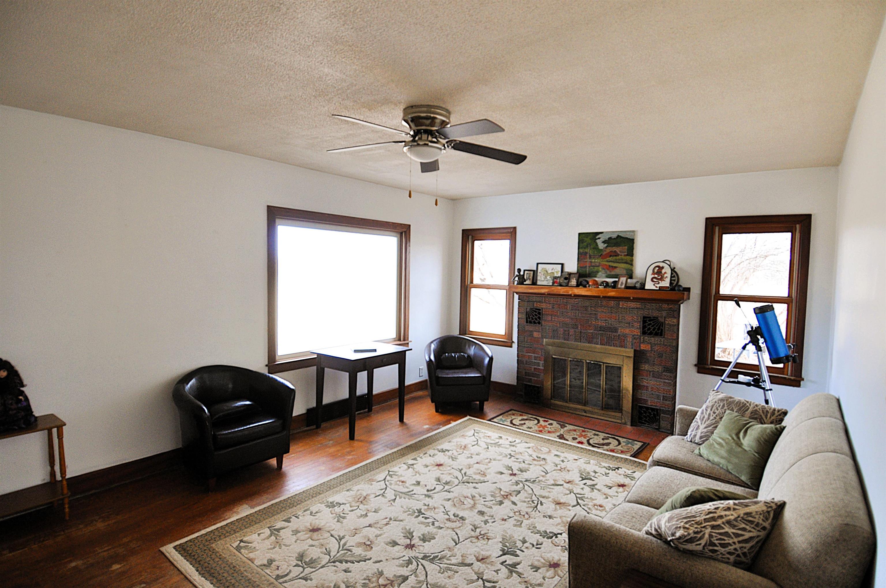 525 Church Street German Valley, IL 61039 - Photo 9 of 25 a living room with furniture and a fireplace