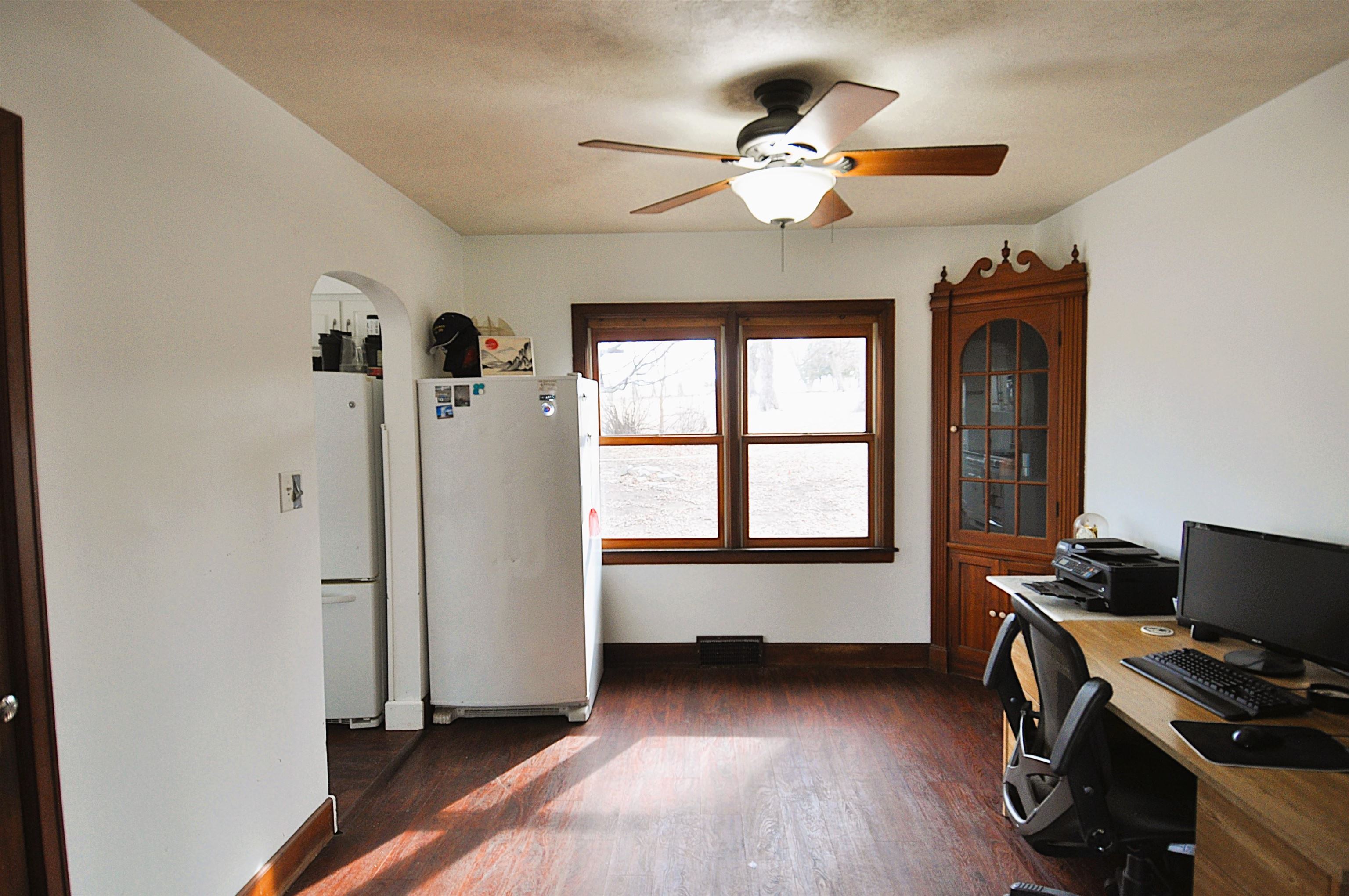 525 Church Street German Valley, IL 61039 - Photo 10 of 25 a view of a workspace with furniture and a window