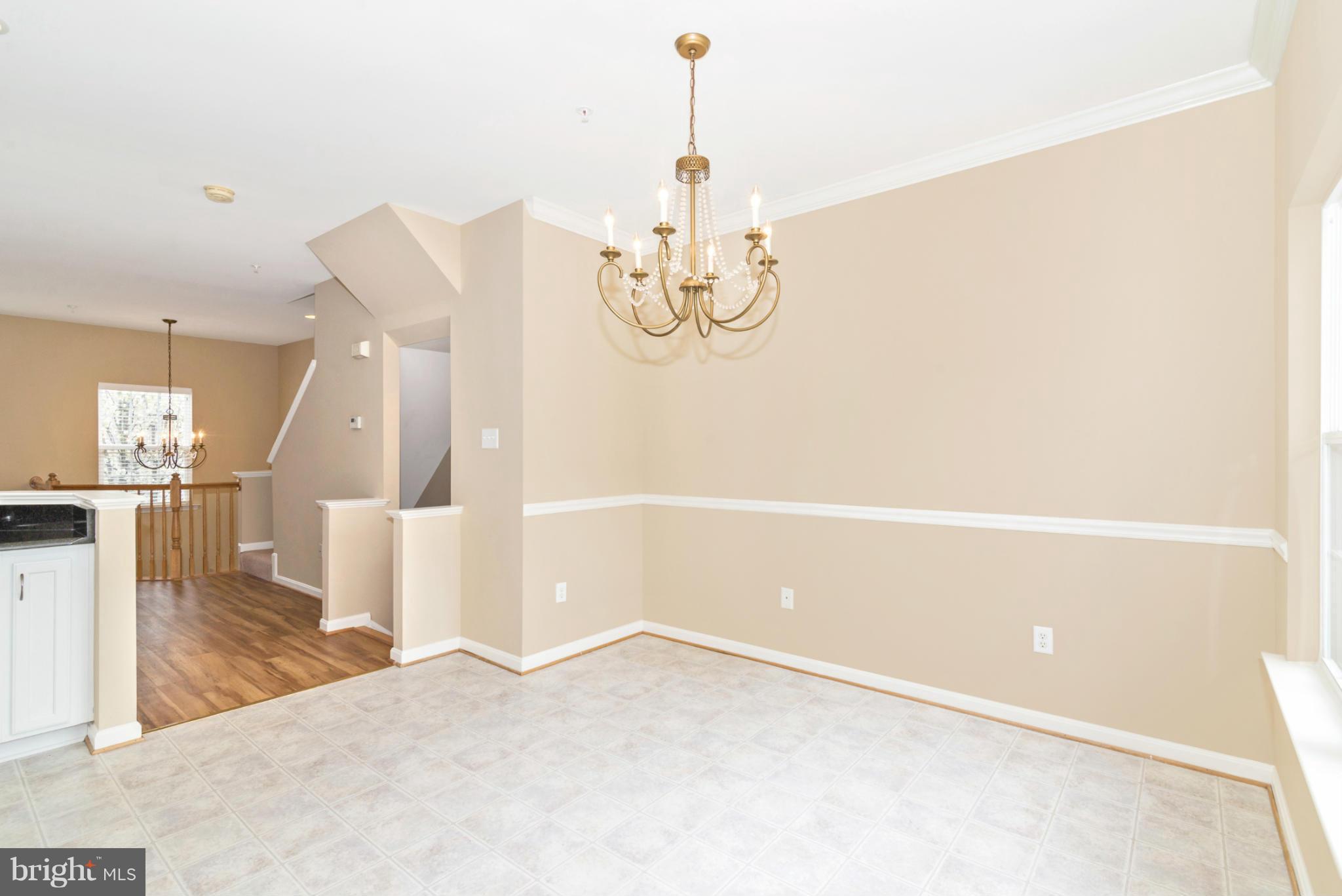 1608 Trestle Street Mount Airy, MD 21771 - Photo 11 of 24 a view of a living room with kitchen island