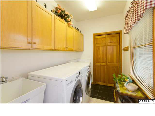 1011 Broken Island Road Palmyra, VA 22963 - Photo 20 of 38 1st Fl. Laundry Room - Home offers Rinnai Tankless Water Heater