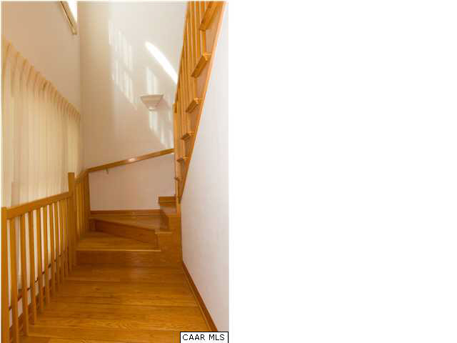 1011 Broken Island Road Palmyra, VA 22963 - Photo 21 of 38 Wide, Inviting Custom Staircase to Guest 2nd Floor