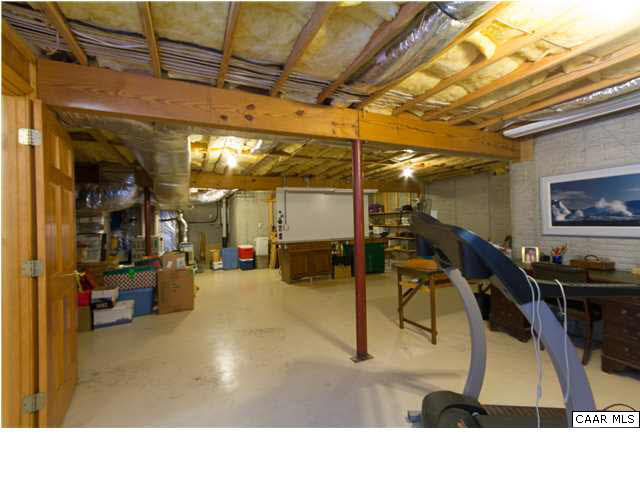 1011 Broken Island Road Palmyra, VA 22963 - Photo 28 of 38 Over 800 sf of Unfin Storage in Basement - Workshop Area - Whole-House Humidification System