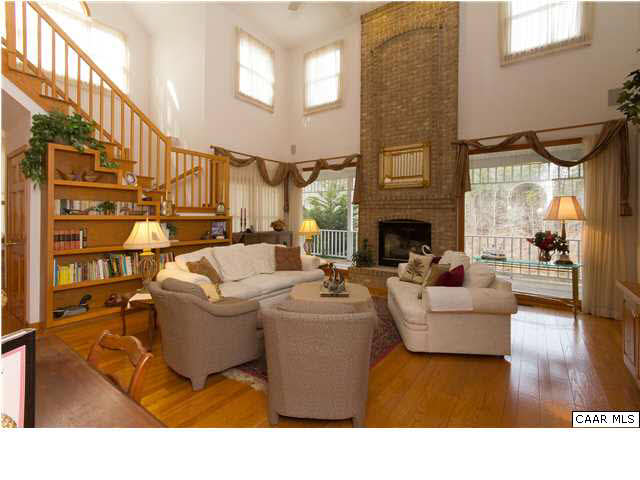 2-Story Greatroom w/Majestic Brick Fireplace w/Raised Sitting Hearth - Hardwood Floors Throughout