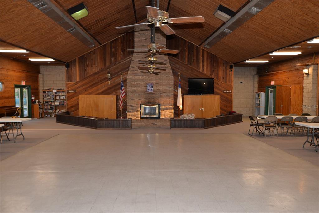 25144 Northeast 140th Loop Fort McCoy, FL 32134 - Photo 14 of 17 a view of a room with gym equipment