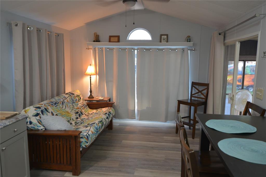 25144 Northeast 140th Loop Fort McCoy, FL 32134 - Photo 6 of 17 a spacious bedroom with bed and a window